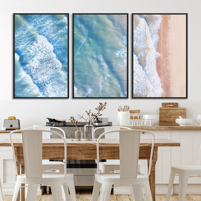 Aerial photo of soft blue waves meeting sandy shore, perfect for modern coastal or beach-themed decor with a light and tranquil aesthetic.