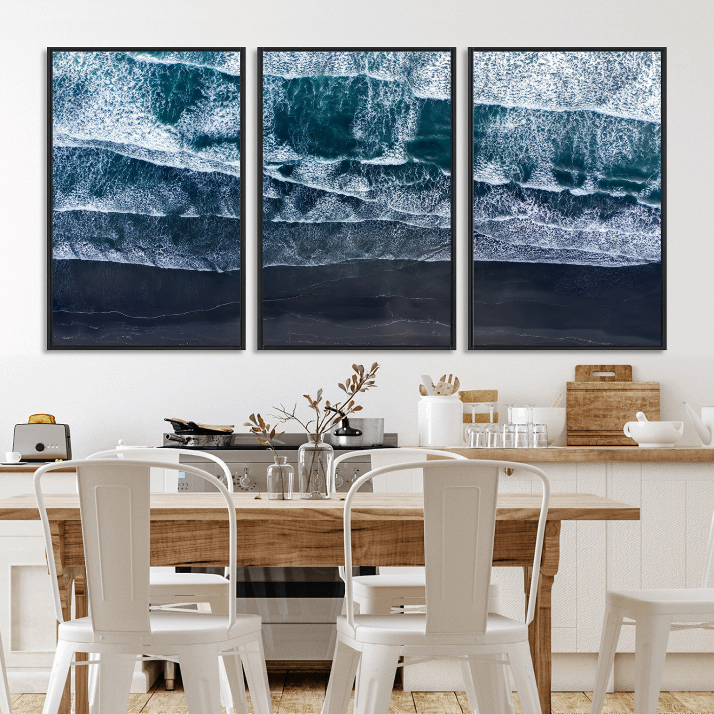 Canvas of aerial ocean waves crashing onto a black sand beach in moody tones, ideal for modern coastal or minimalist home decor.