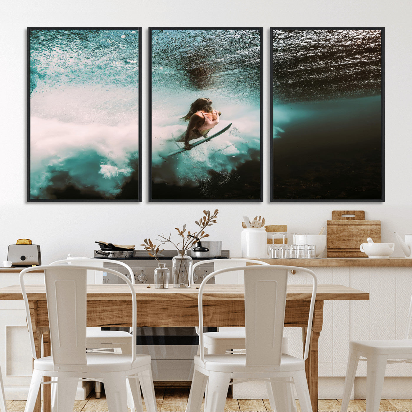 Vibrant underwater photo of a female surfer diving through turquoise waves, perfect for coastal boho or surf-inspired home decor.