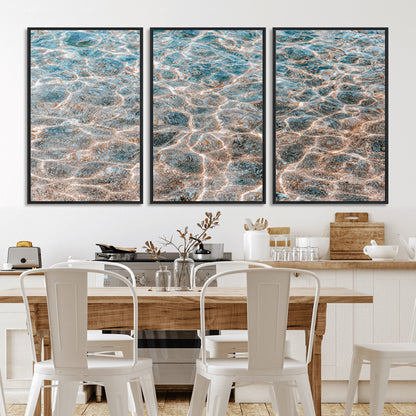 Close-up of sunlit ocean ripples with aqua blue and golden tones, ideal for modern coastal or minimalist home decor.