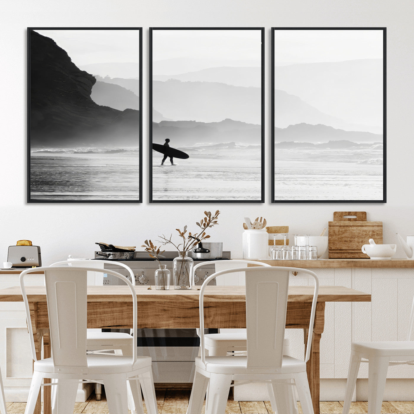A lone surfer walking along a misty beach with cliffs in the background, carrying their board, capturing a serene and minimal ocean moment.