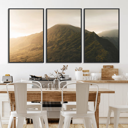 Sunlit mountain peak with mist rolling over its rugged slopes, bathed in golden light, creating a warm and tranquil nature-inspired scene.