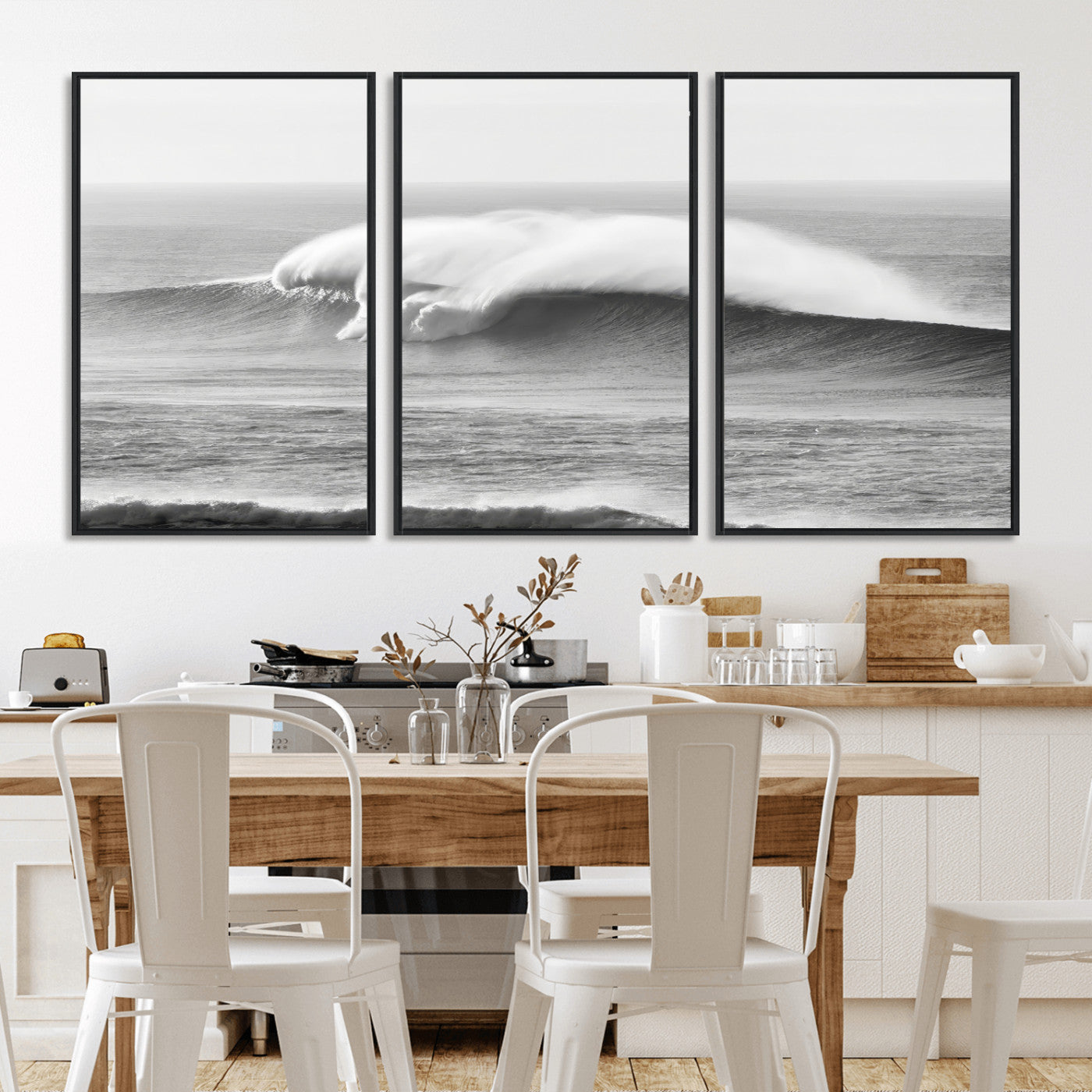 A dramatic black and white ocean wave crashing with immense force, capturing the raw power and movement of the sea in a bold seascape.