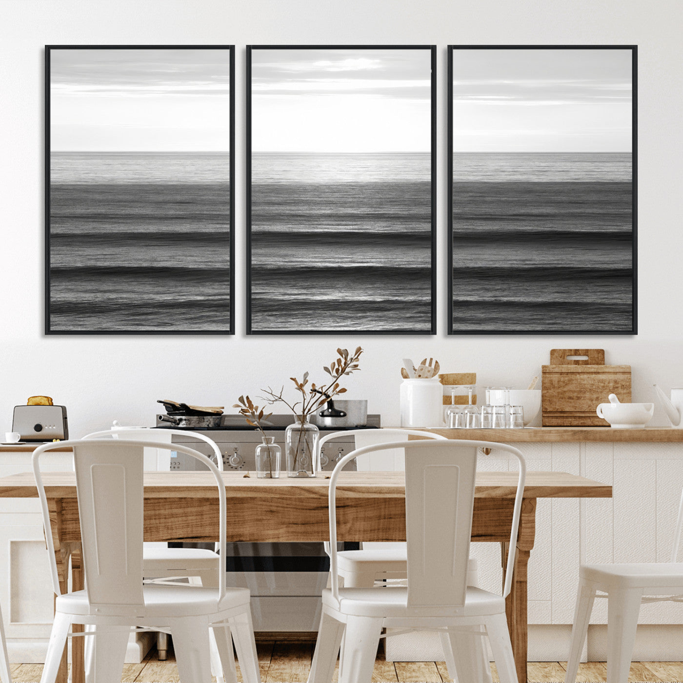 Minimalist black and white ocean view with layered waves reflecting sunlight, evoking a sense of calm and coastal serenity.