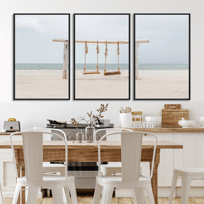 A rustic wooden beach swing stands on a serene sandy shore with an ocean horizon in the background, creating a tranquil and dreamy coastal escape.