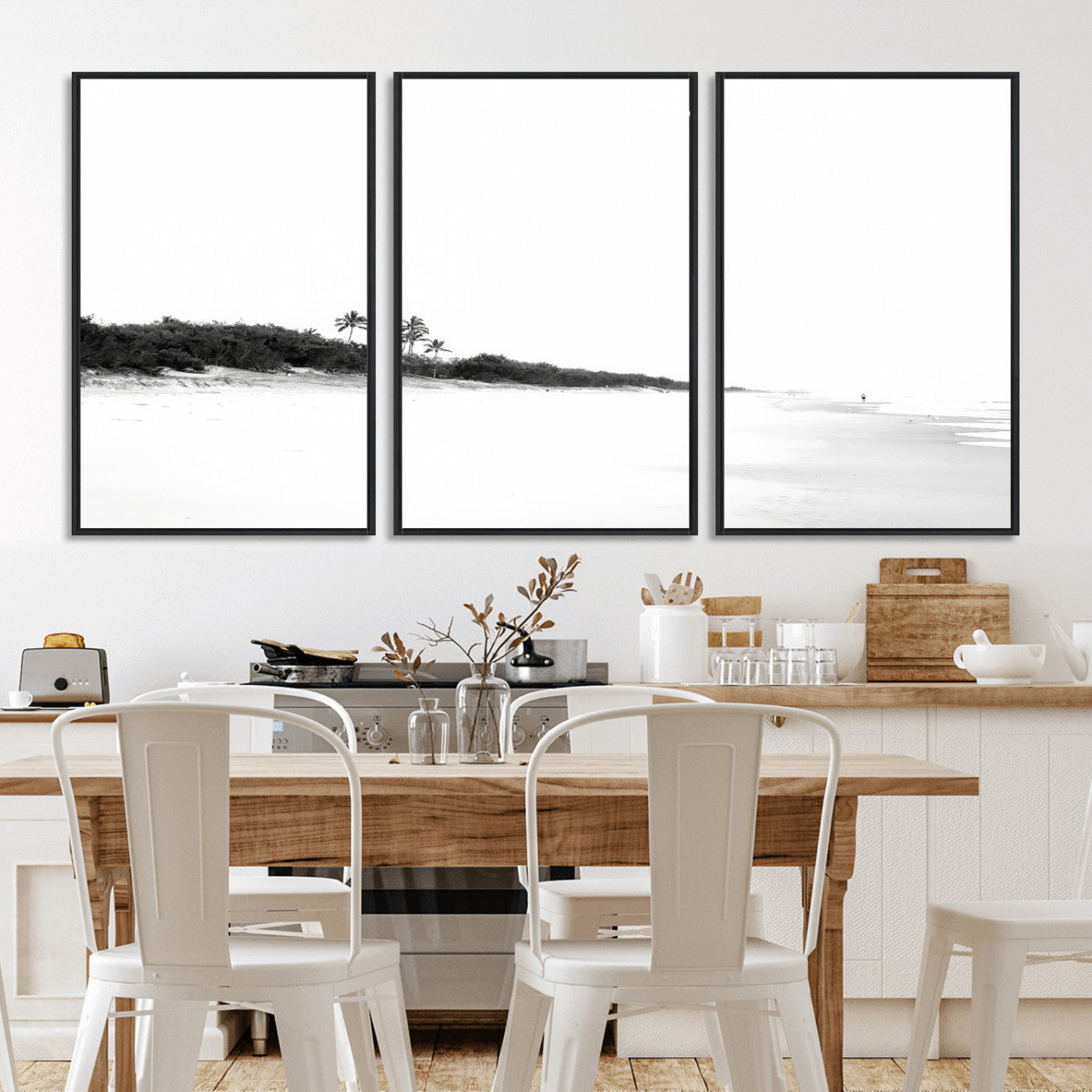 A black and white minimalist coastal scene with a vast open beach, distant palm trees, and a lone figure walking along the shoreline, evoking serenity and solitude.