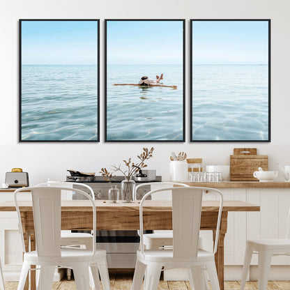 A peaceful minimalist scene of a person floating on crystal-clear water, surrounded by a vast open horizon, capturing relaxation and serenity in a tranquil aquatic setting.