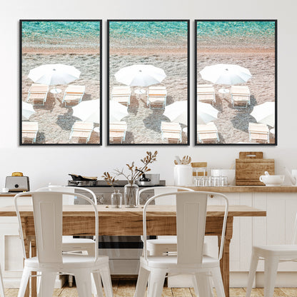 A bright beach scene with white umbrellas, pastel sand, and turquoise waters, creating a tranquil coastal vibe, perfect for beach house or summer decor.