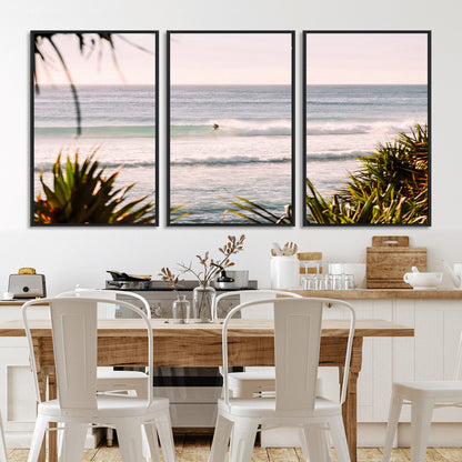 Canvas of a lone surfer riding a pastel wave at sunrise, perfect for tropical or coastal-themed spaces with a relaxed, airy vibe.