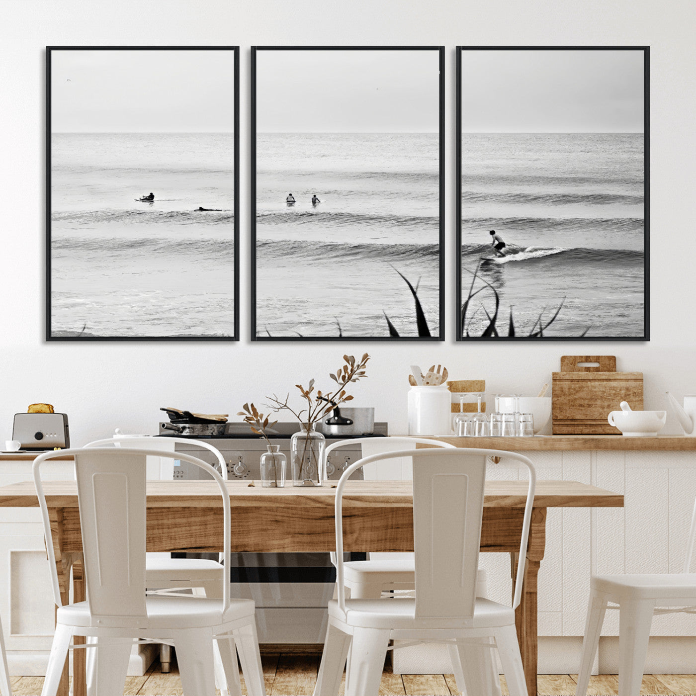 Monochrome canvas of surfers on calm ocean waves, ideal for minimalist coastal or beach-inspired interior decor.