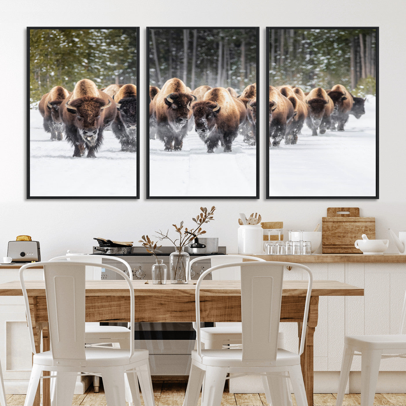 A herd of American bisons walking through a snowy forest path, perfect for rustic cabin or Western-themed wall decor.