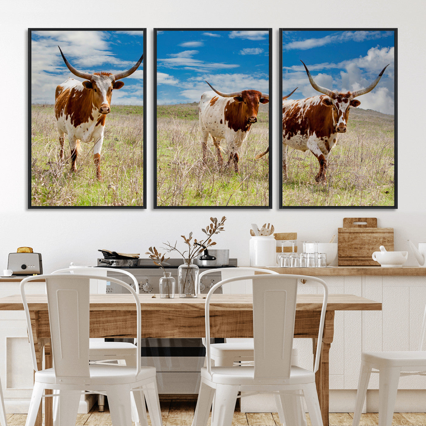 Three Texas longhorn cattle standing in dry grass under a bright blue sky, ideal for farmhouse or western rustic home decor.