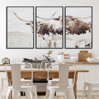 Two longhorn cows standing in a sepia-toned pasture with soft light, ideal for rustic or farmhouse-themed neutral wall decor.