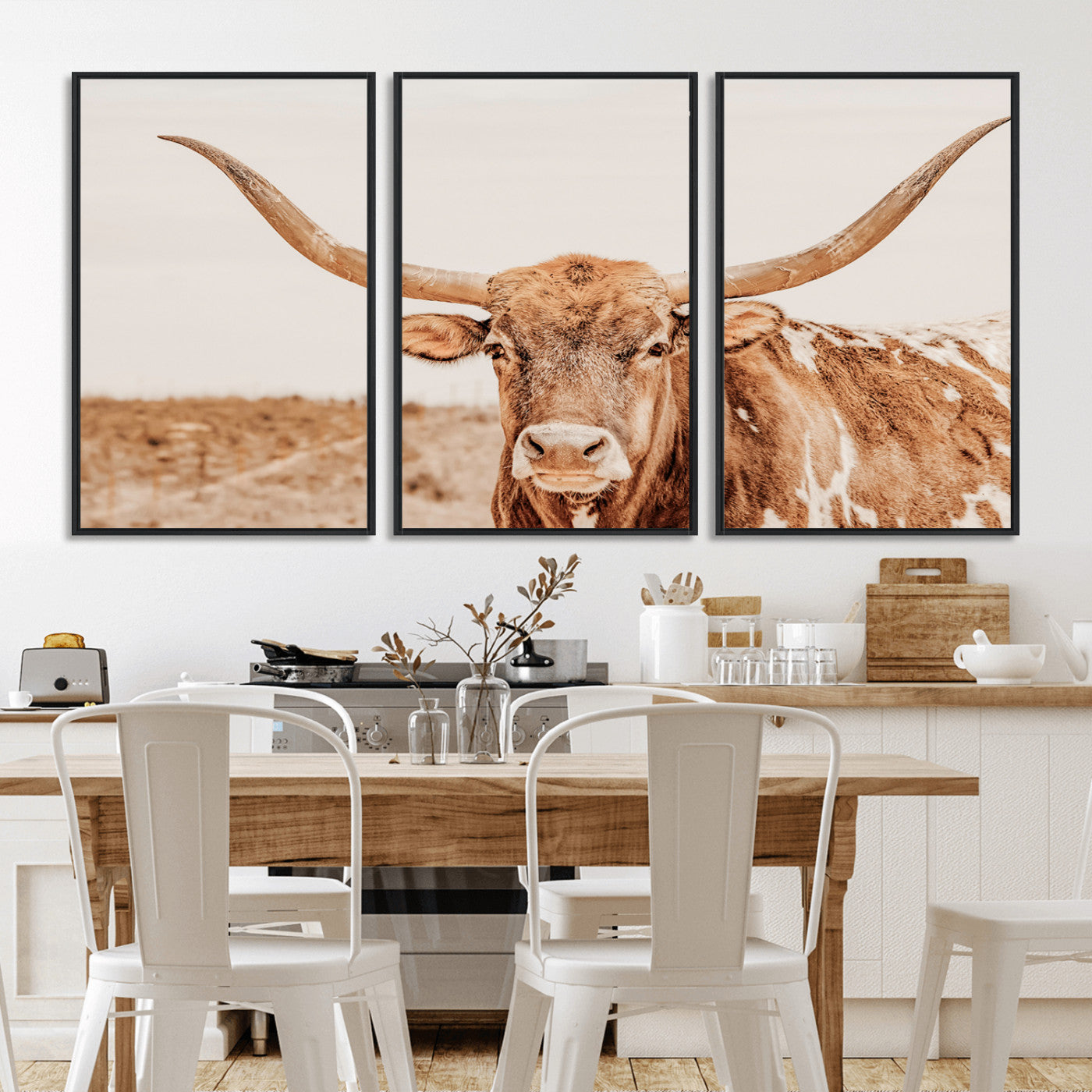 A longhorn bull standing proudly in a sunlit desert field with warm neutral tones, ideal for rustic western or farmhouse interiors.