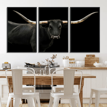 Close-up of a black Texas longhorn with large curved horns on black background, ideal for rustic farmhouse or modern western interiors.