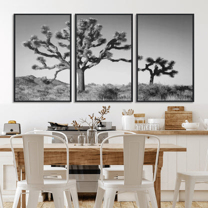 Black and white Joshua trees in a rugged desert landscape, creating a calm and minimalist feel for natural or rustic-themed interiors.