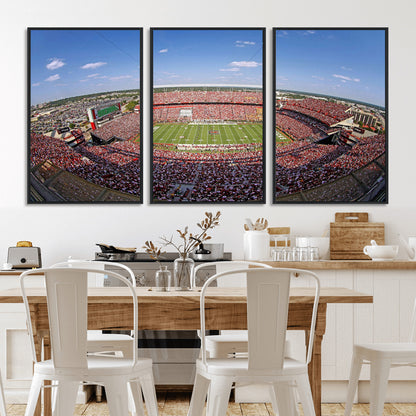 An William Brice-Stadium view of a full football stadium with cheering fans and clear blue skies, capturing the excitement and energy of the game.