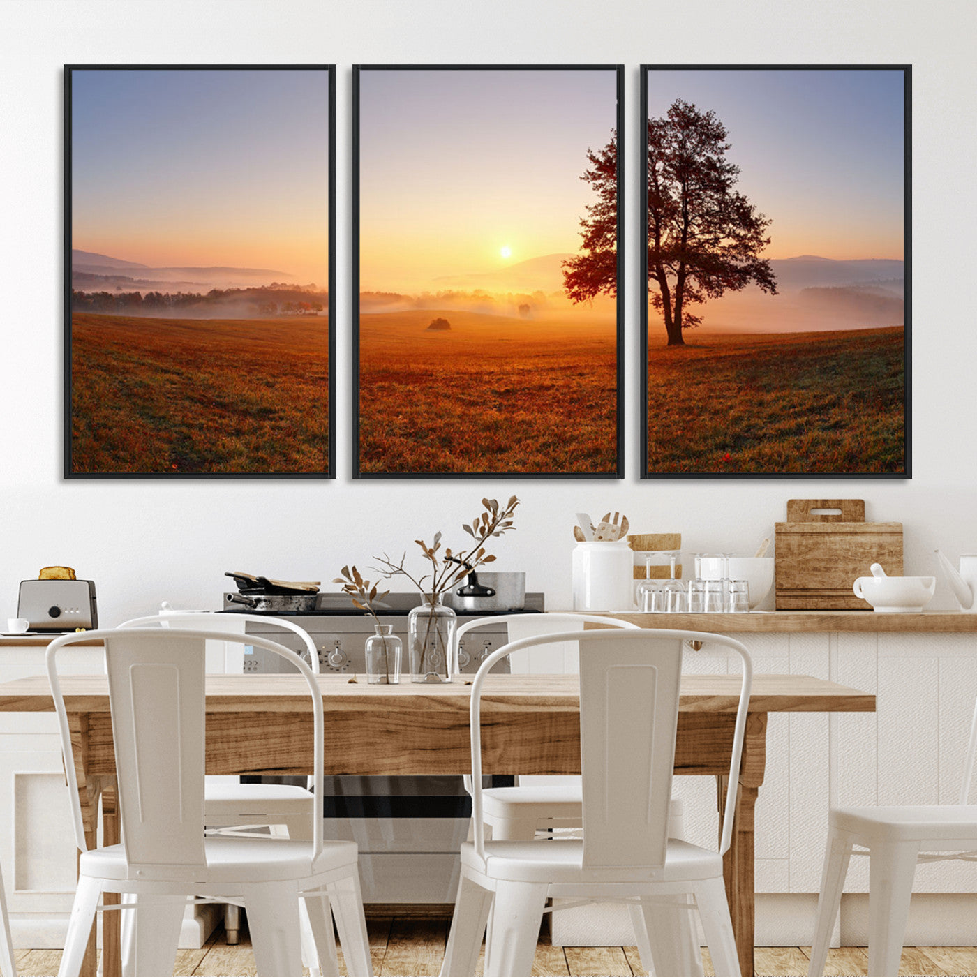 A tranquil landscape at sunrise with a mist-covered field and a lone tree, creating a peaceful and natural atmosphere.