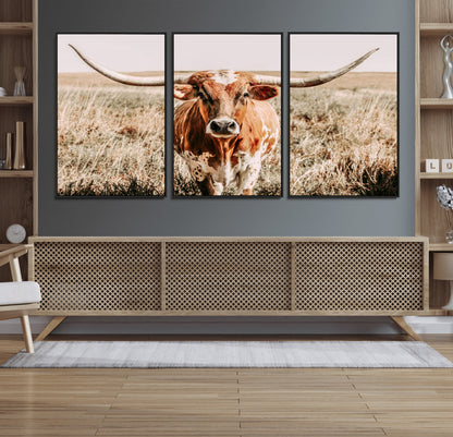 Framed longhorn cow canvas wall art with rustic prairie background, western animal print perfect for farmhouse or ranch style decor
