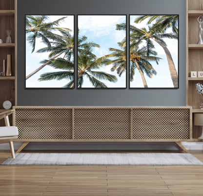 Framed canvas of tall palm trees reaching into a tropical sky, ideal for beach home or relaxed island-inspired wall decor.