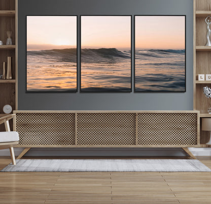 Framed canvas of ocean waves glowing in sunset light, ideal for golden hour calm or peaceful coastal-inspired wall decor.