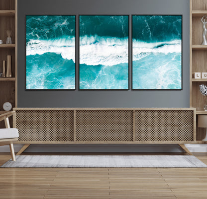Aerial view of turquoise ocean waves crashing with white foam, perfect for tropical coastal or modern beach-style home decor.