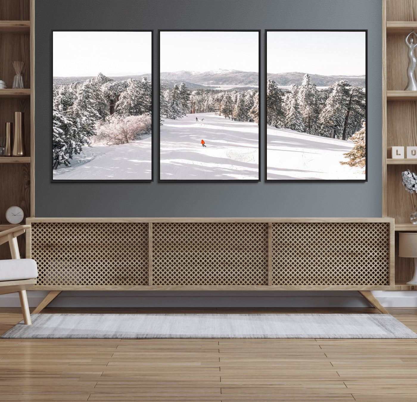 Bright ski trail lined with snow-covered pines and a skier in orange, perfect for alpine adventure or winter sports-inspired decor.