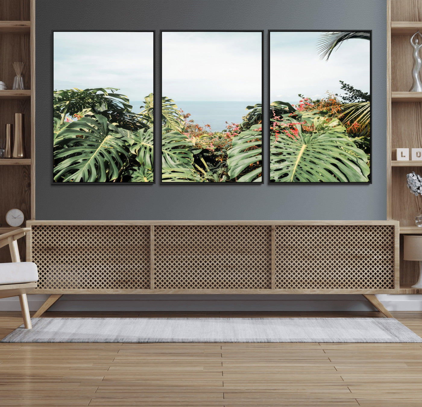 Monstera leaves and tropical flowers framing a calm ocean view, ideal for tropical coastal or exotic jungle-style interior wall decor.