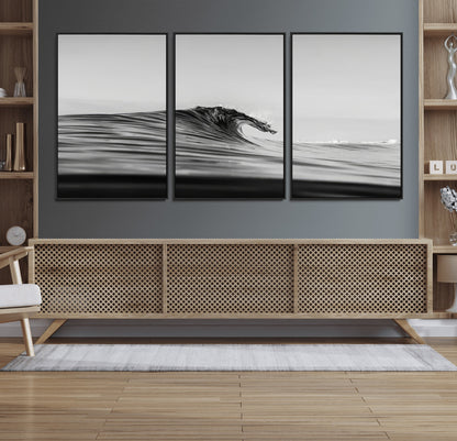 Striking black and white photo of a curling wave, ideal for modern coastal or minimalist wall decor settings.