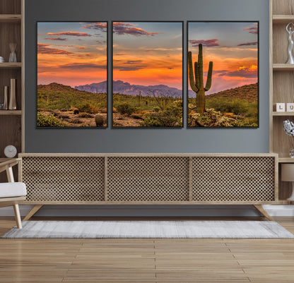 Vibrant desert sunset with saguaro cacti and distant mountains, perfect for Southwestern or warm-toned home decor.