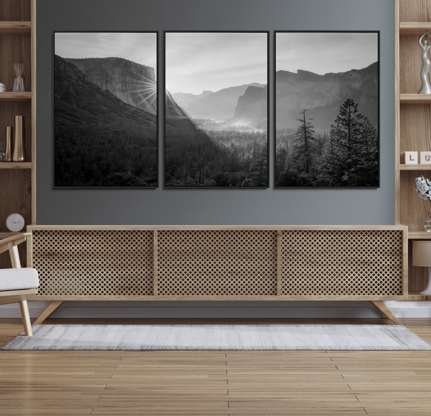 Black and white landscape of Yosemite with sun rays peeking over El Capitan, ideal for moody nature or modern rustic decor.