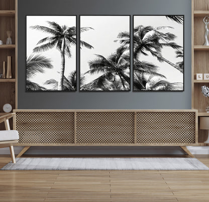 Black and white canvas of tall palm trees in moody tones, perfect for modern tropical minimalist or coastal-style home decor.
