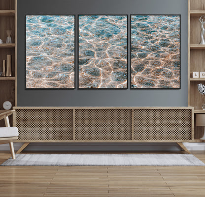 Close-up of sunlit ocean ripples with aqua blue and golden tones, ideal for modern coastal or minimalist home decor.