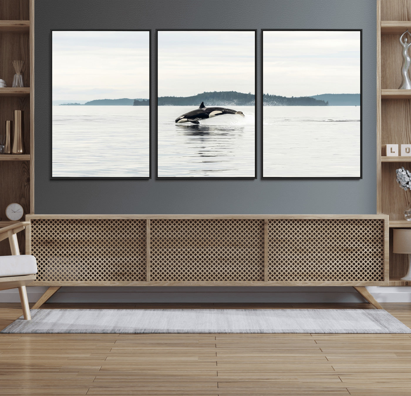 An orca jumping out of calm ocean waters with a misty island in the background, creating a serene and minimalist marine wildlife scene.
