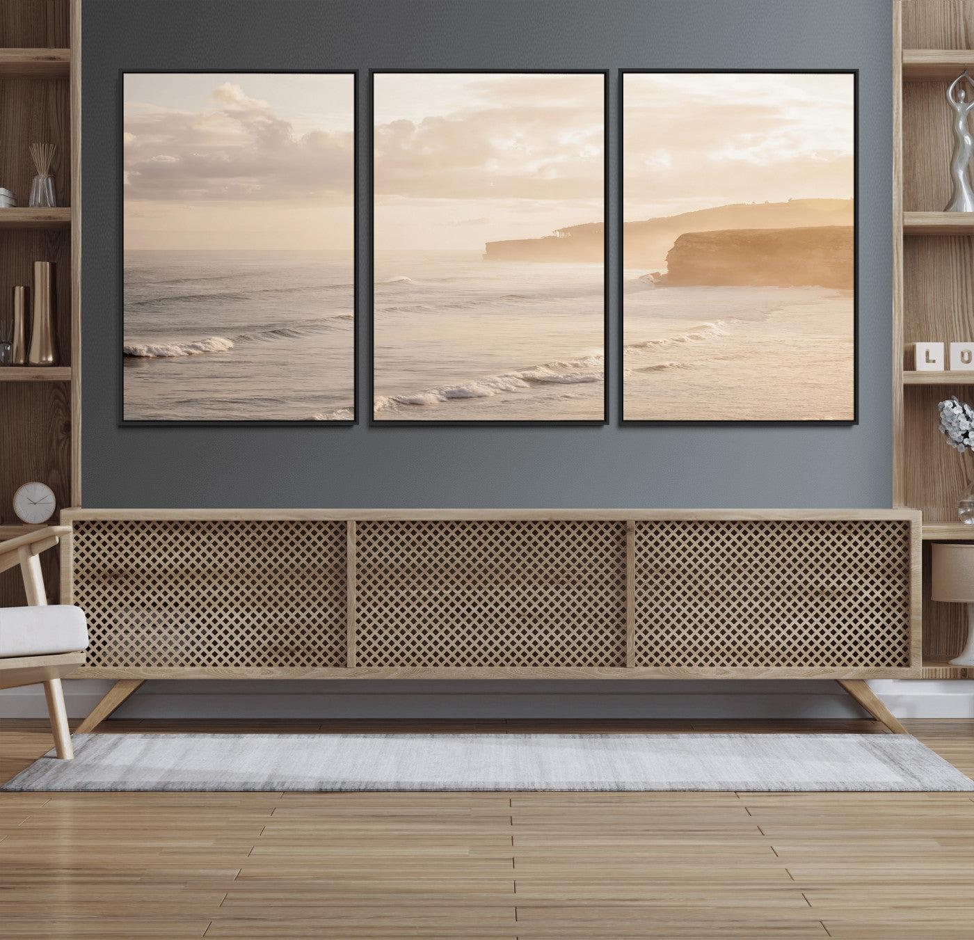 Golden hour seascape with misty cliffs and gentle waves rolling towards the shore, capturing a tranquil and warm coastal atmosphere.