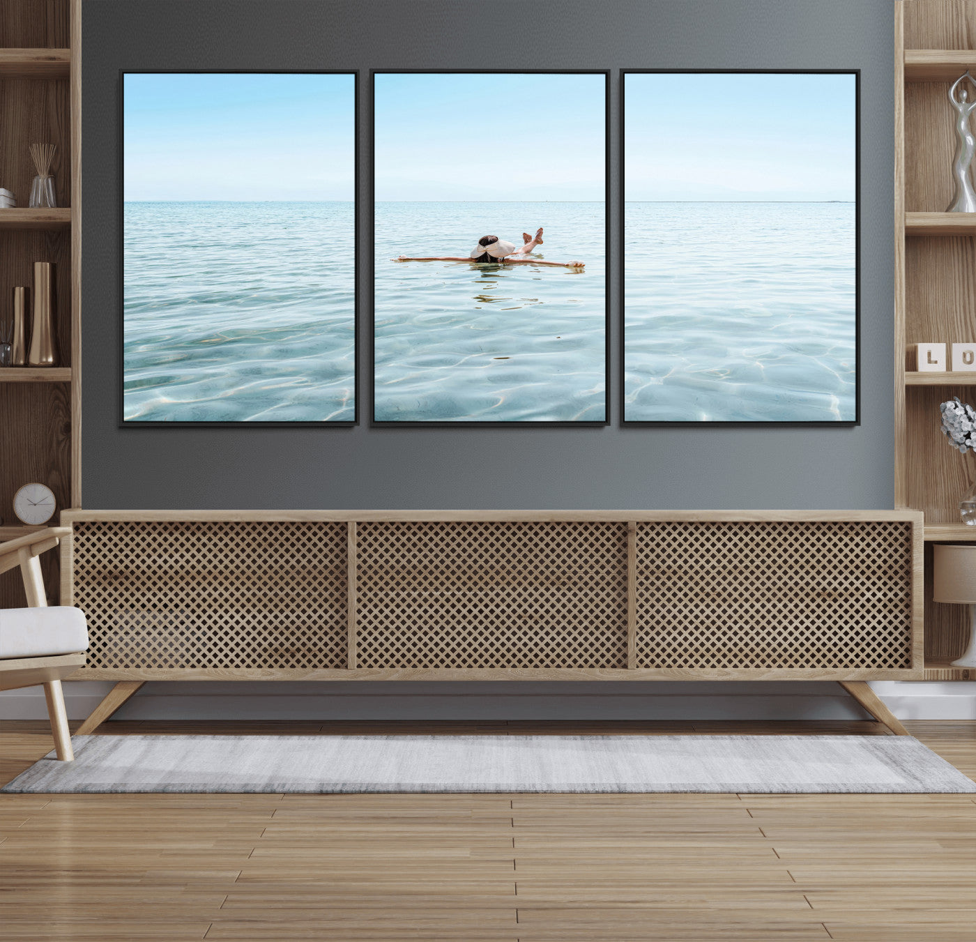 A peaceful minimalist scene of a person floating on crystal-clear water, surrounded by a vast open horizon, capturing relaxation and serenity in a tranquil aquatic setting.