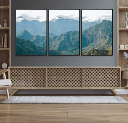 A misty mountain landscape with cloud-covered Andean peaks and lush green valleys, creating a dramatic and serene view, perfect for rustic or nature-inspired home decor.