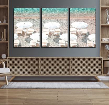 A bright beach scene with white umbrellas, pastel sand, and turquoise waters, creating a tranquil coastal vibe, perfect for beach house or summer decor.