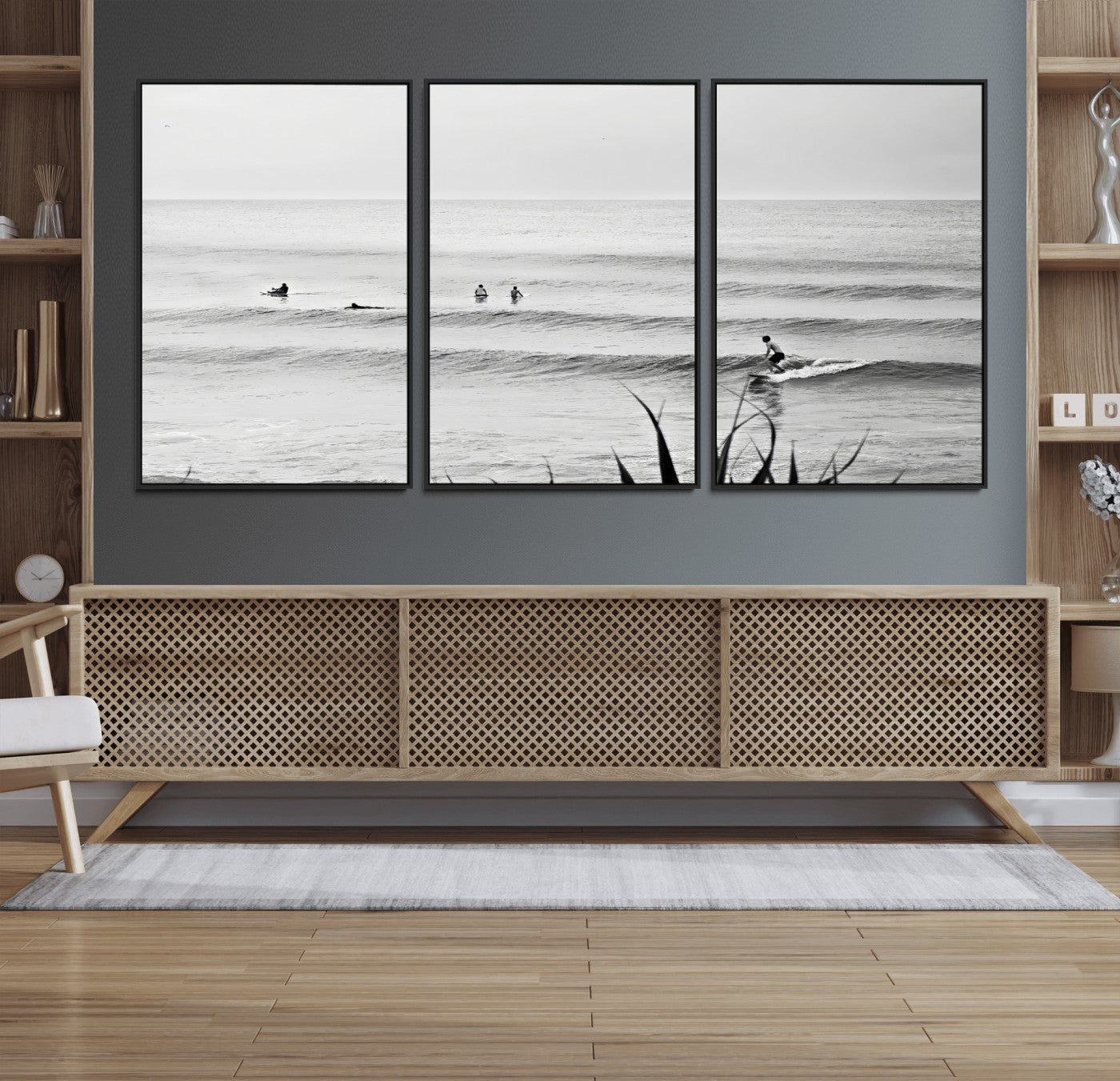 Monochrome canvas of surfers on calm ocean waves, ideal for minimalist coastal or beach-inspired interior decor.