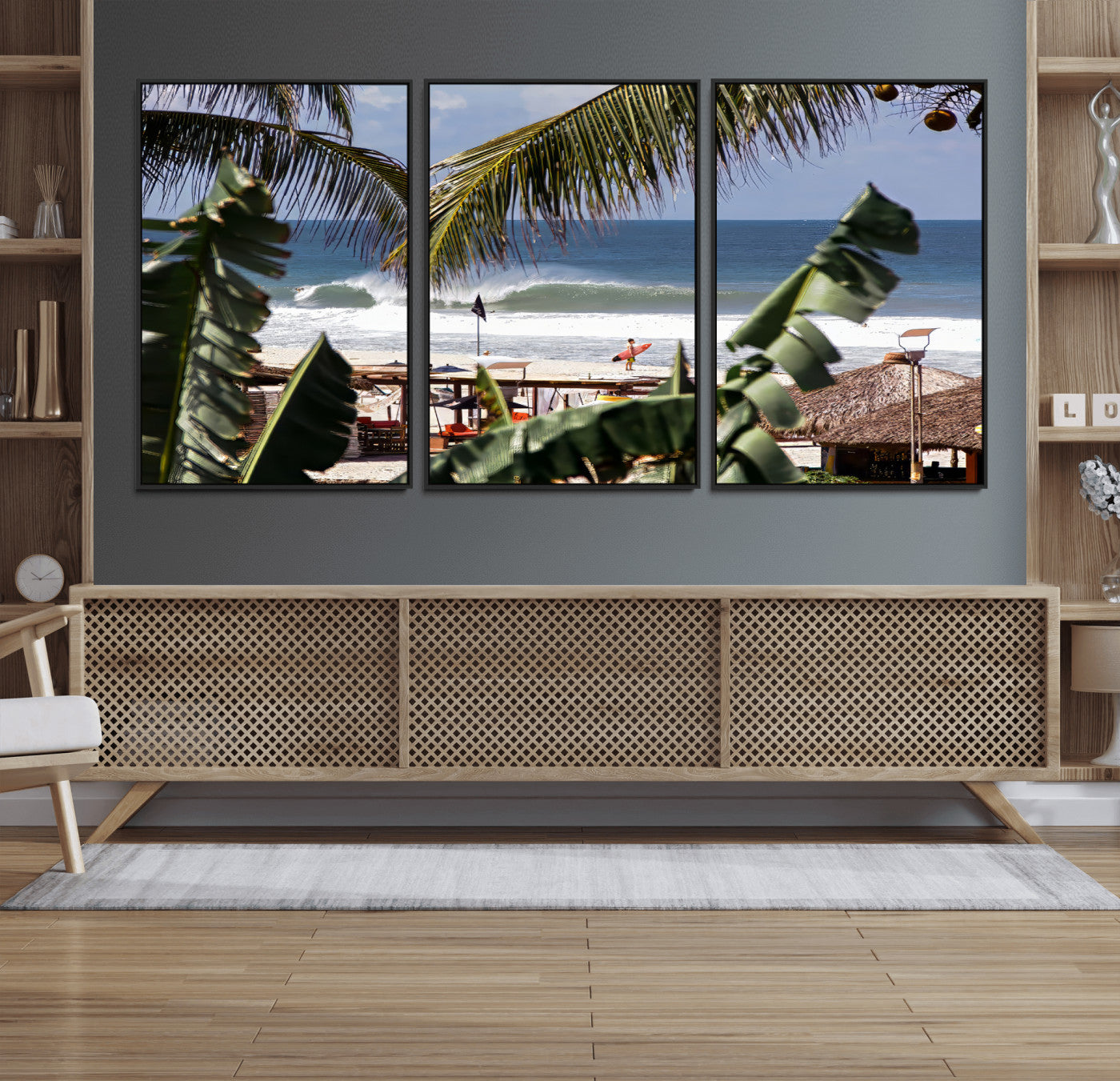 Canvas wall art of a tropical surf scene framed by palm trees, with a surfer on the shore and waves rolling in, ideal for beach-themed decor.