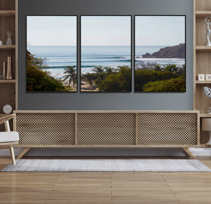 View of calm ocean waves with palm trees and a tropical coastline, ideal for coastal boho or beach-themed wall decor.