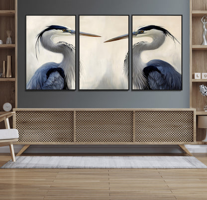 Two blue herons facing each other on a soft neutral background, ideal for coastal, tranquil, or nature-inspired minimalist interiors.