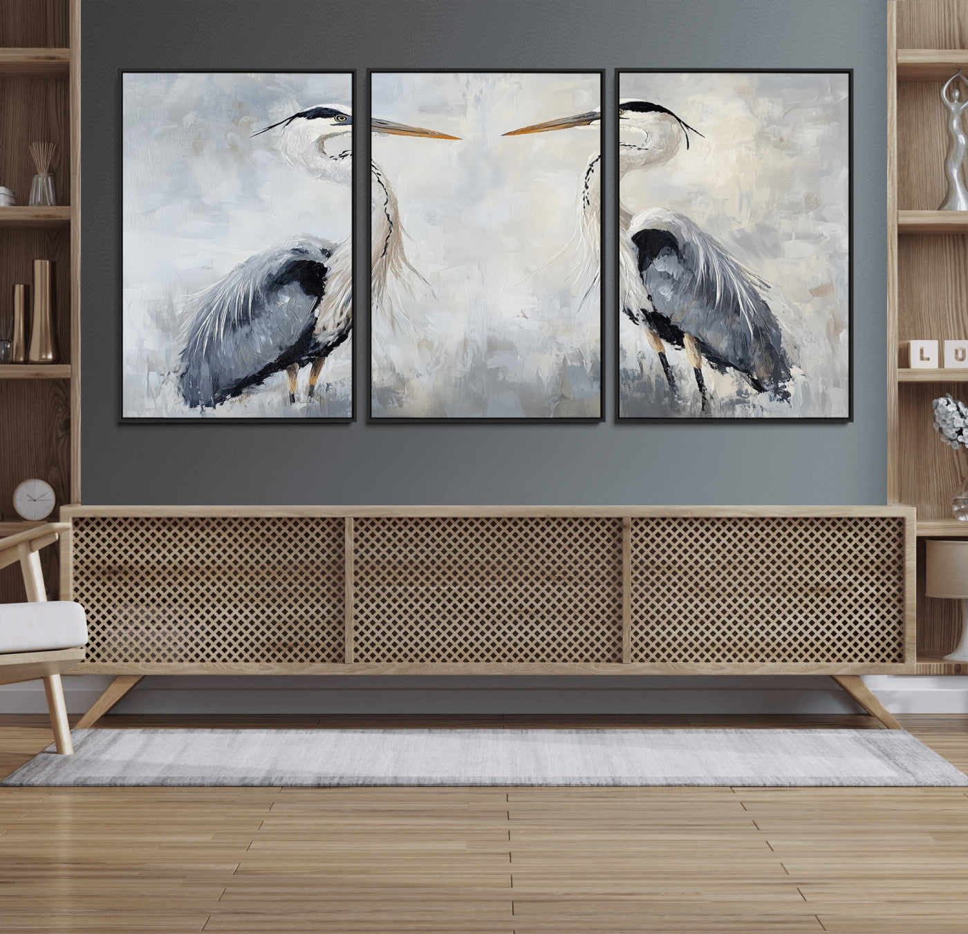 Two herons facing each other on a soft-toned background with blue-grey feathers, perfect for tranquil, coastal or nature-themed interiors.