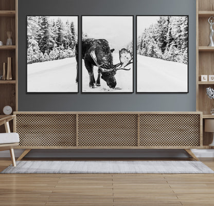 A majestic moose grazing in the snow-covered wilderness, surrounded by snow-covered trees, creating a peaceful winter scene.