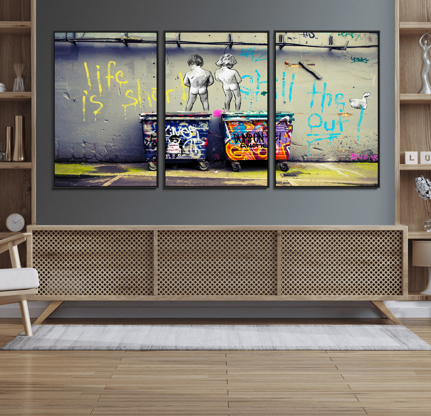 Graffiti-style canvas art with bold text and two naked figures over urban dumpsters, ideal for edgy or street-style decor.