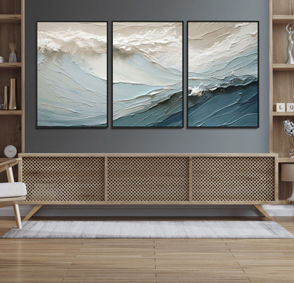 Textured canvas of ocean waves in soft coastal blues and creamy whites, ideal for modern or minimalist coastal-style interiors.