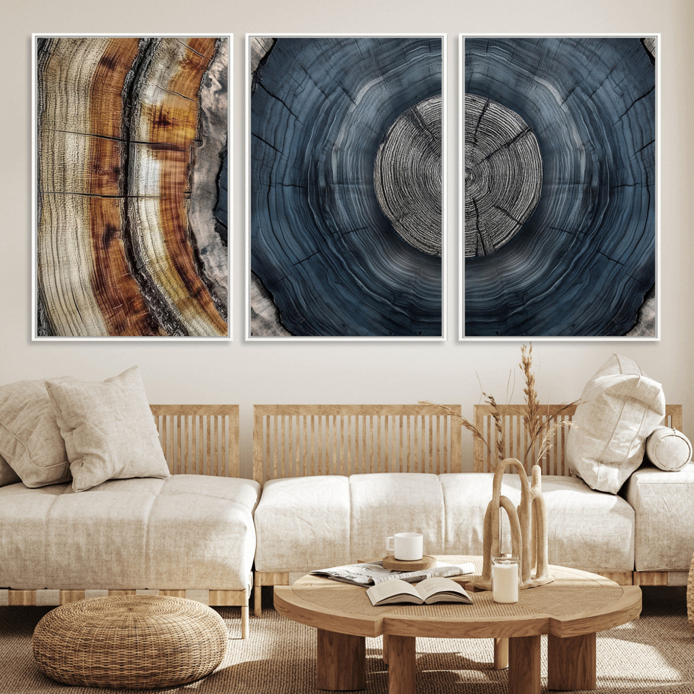 A stunning close-up of a tree trunk showing the intricate, circular growth rings, showcasing the natural textures and rich contrasts in deep blues, browns, and silvers.