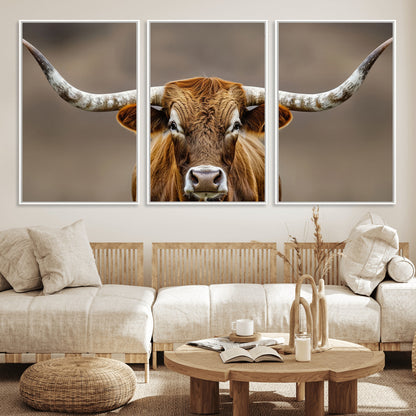 Close-up of a Texas Longhorn with strong curved horns and warm brown tones, perfect for rustic or western-style wall decor.