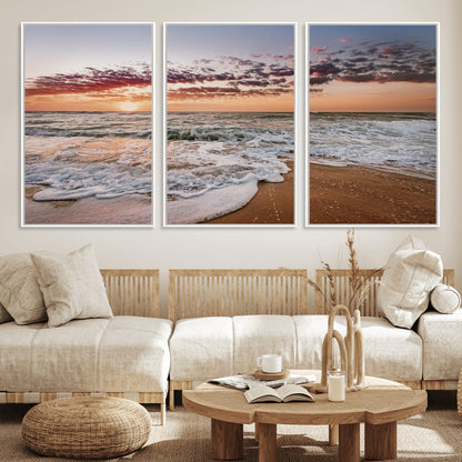 Canvas of a sunset over a foamy ocean shore with warm light and gentle waves, ideal for coastal or beach-themed home decor.