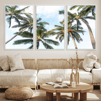 Framed canvas of tall palm trees reaching into a tropical sky, ideal for beach home or relaxed island-inspired wall decor.